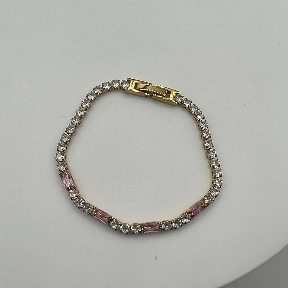 454. Elegant Gold and Pink Bracelet